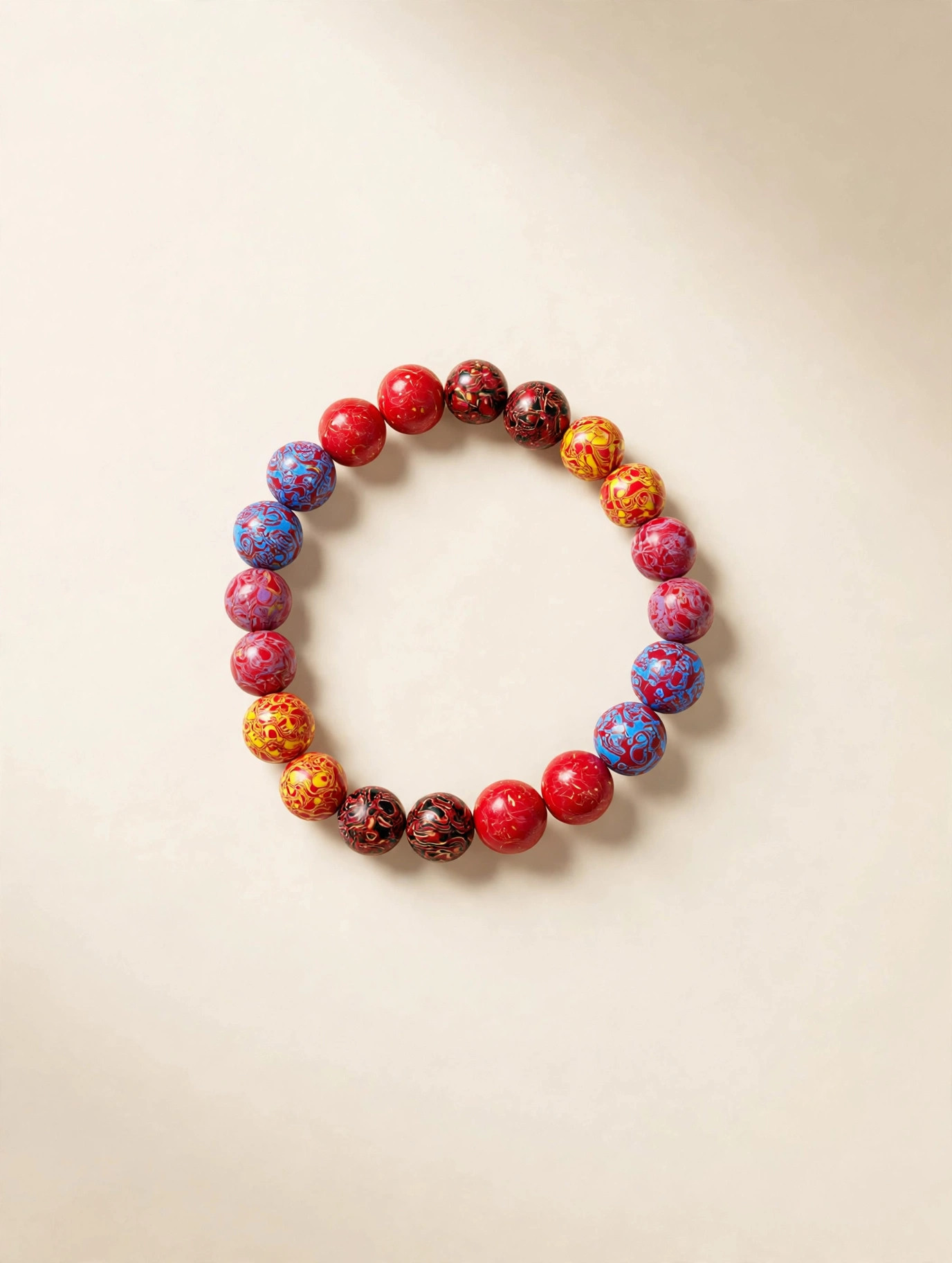 Multicolor Carved Bead Bracelet in red, blue and gold