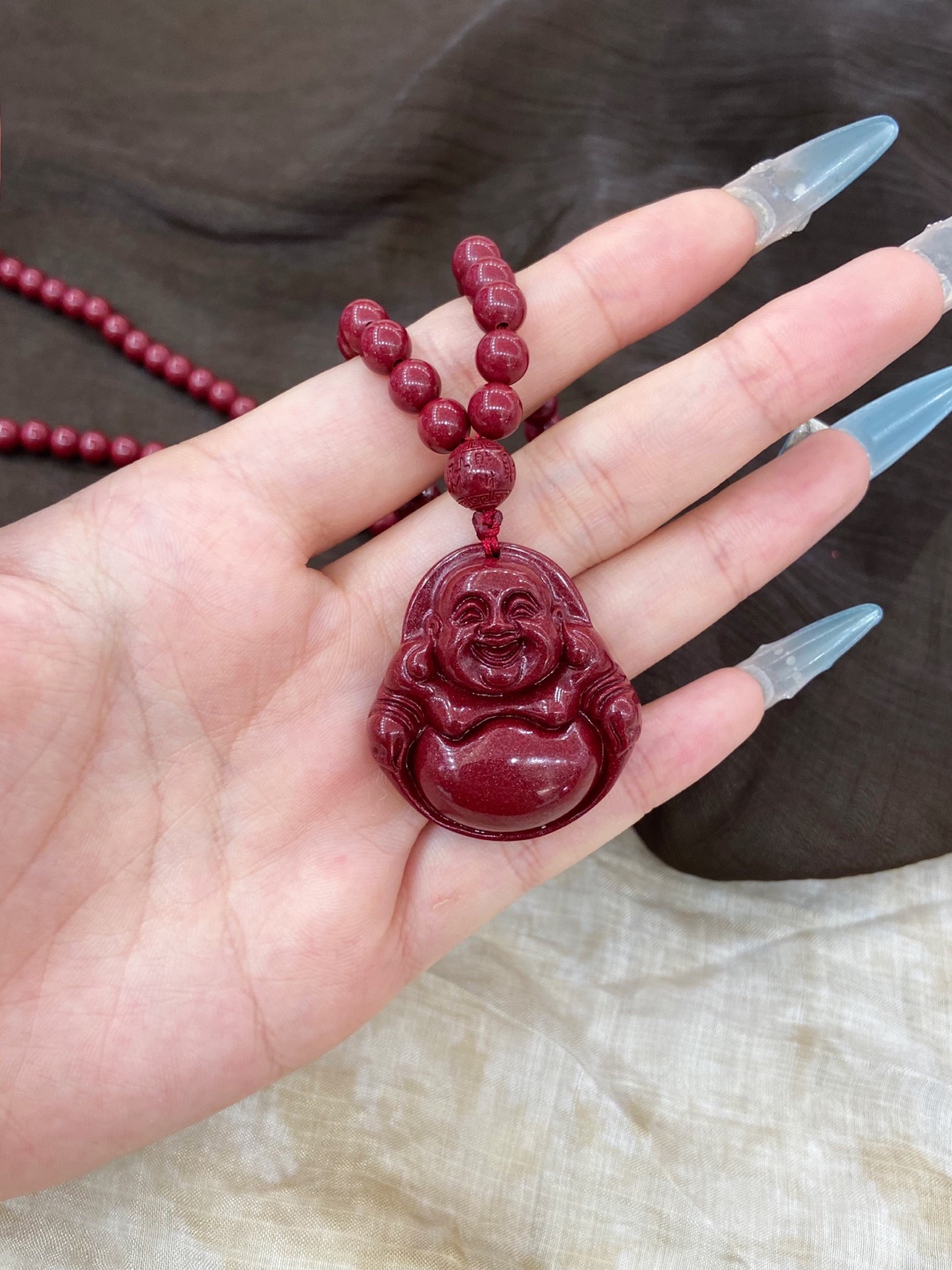 Cinnabar Laughing Maitreya Buddha Necklace